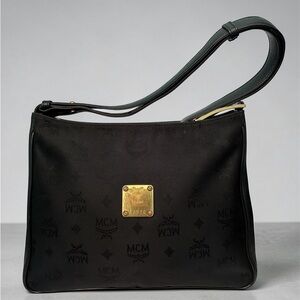 MCM Black Messenger Bag with Gold Accents